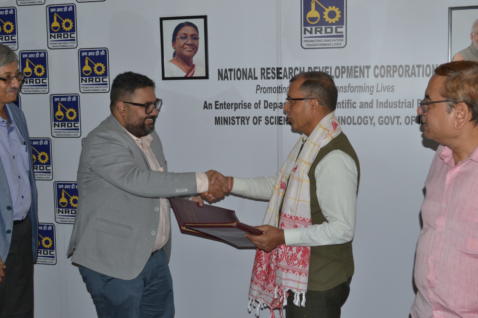 Handshake between NRDC CMD and trubits Director after exchanging the signed MoA